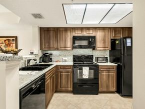5031 Wiles Road 107, Coconut Creek FL 33073