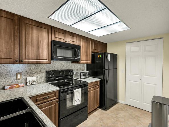 5031 Wiles Road 107, Coconut Creek FL 33073