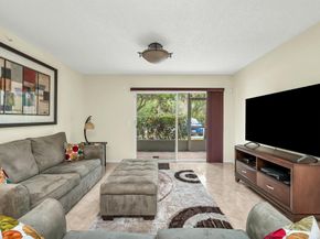 5031 Wiles Road 107, Coconut Creek FL 33073