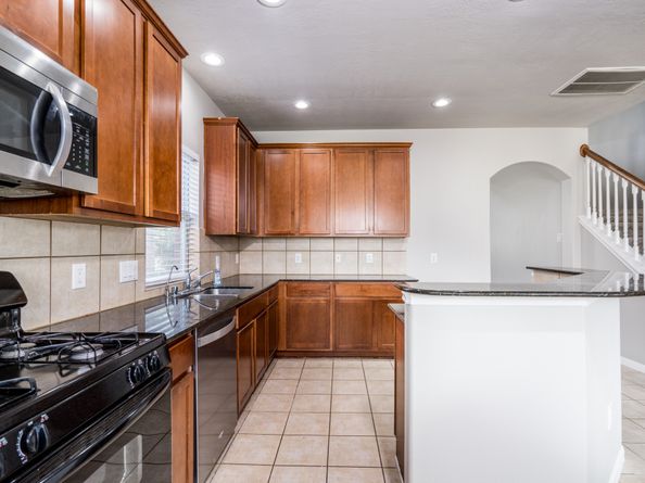 12947 E Millstream Bend Lane, Tomball TX 77377