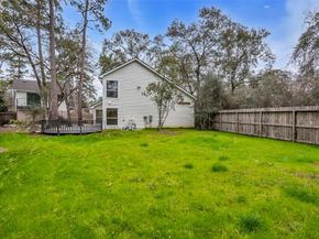 4 N Autumnwood Way, The Woodlands TX 77380