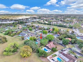 9300 E Calusa Club Dr, Miami FL 33186