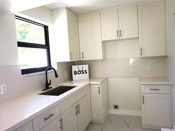 53 NW 68th St, Miami FL 33150