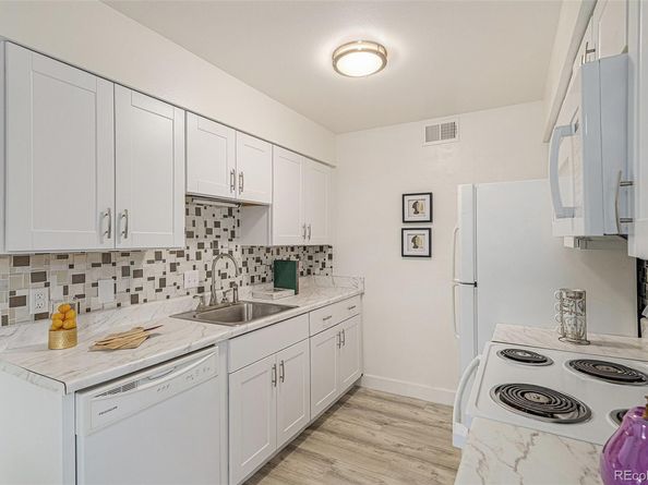 3141 S Tamarac Drive 101F, Denver CO 80231