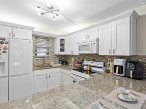 9300 SW 8th Street 102, Boca Raton FL 33428