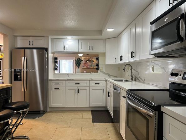 9894 Fairway Cove Lane, Plantation FL 33324