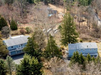 242 and 244 S SUGAN ROAD