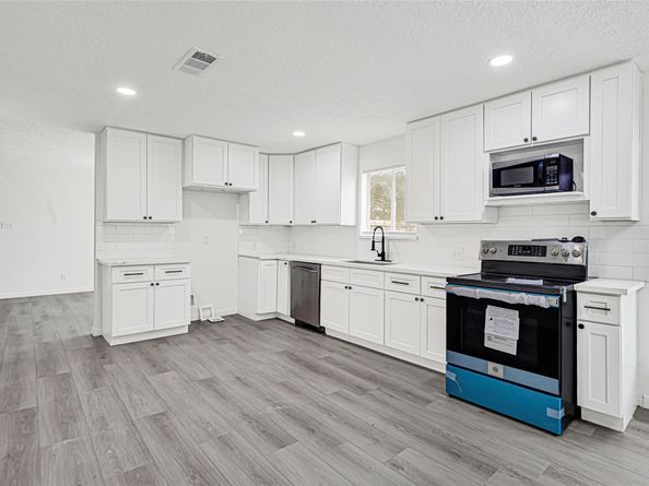 14823 Elmont Drive, Houston TX 77095