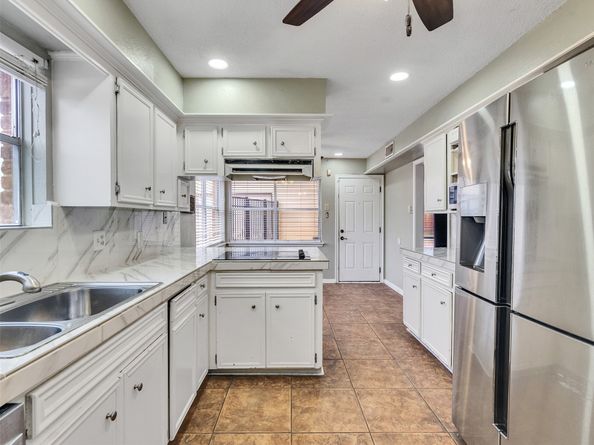 15703 Crestbrook Drive, Houston TX 77059