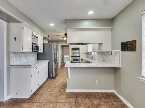 15703 Crestbrook Drive, Houston TX 77059