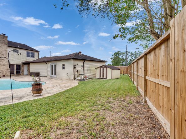 15703 Crestbrook Drive, Houston TX 77059