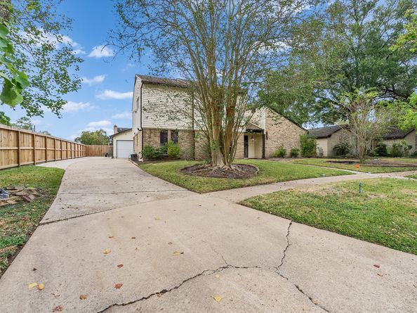 15703 Crestbrook Drive, Houston TX 77059