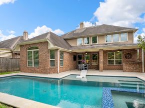 7 E Wading Pond Circle, The Woodlands TX 77375