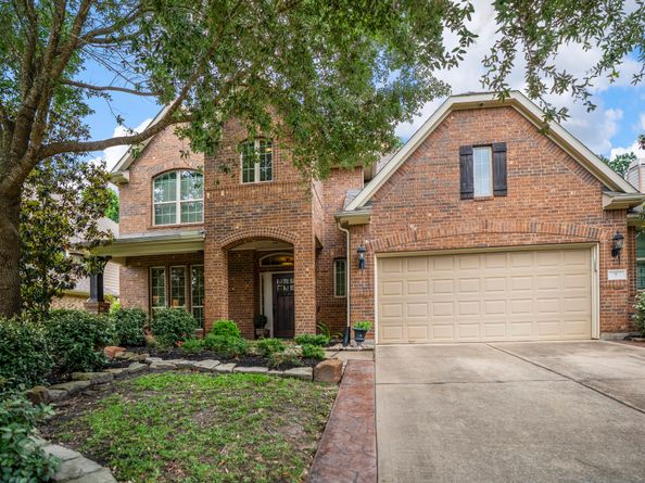 7 E Wading Pond Circle, The Woodlands TX 77375
