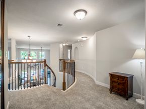7 E Wading Pond Circle, The Woodlands TX 77375