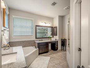 7 E Wading Pond Circle, The Woodlands TX 77375