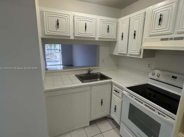 484 NW 165th St Rd A214, Miami FL 33169