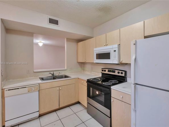 1103 Golden Lakes Blvd 1013, West Palm Beach FL 33411