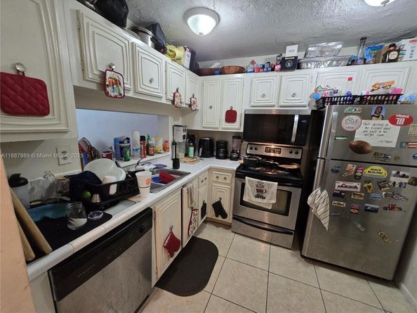 498 NW 165th St Rd D405, Miami FL 33169