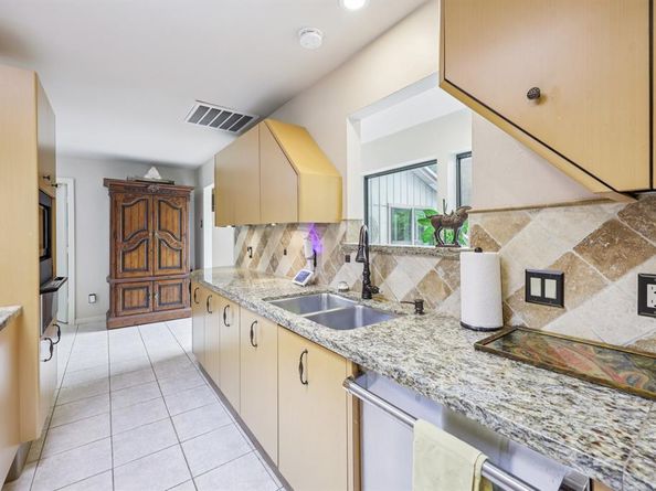 16702  Village Lane , Dallas Texas 75248