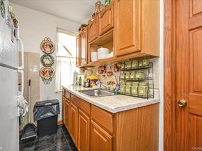 6033 80th Avenue, Glendale NY 11385