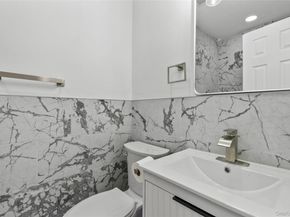 8 Marc Drive, Ridge NY 11961