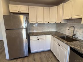 40 Canoe Place Road 4, Hampton Bays NY 11946