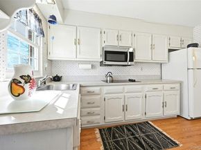 128D Exmore Court, Ridge NY 11961