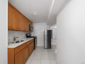 10407 94th Avenue, Ozone Park NY 11416