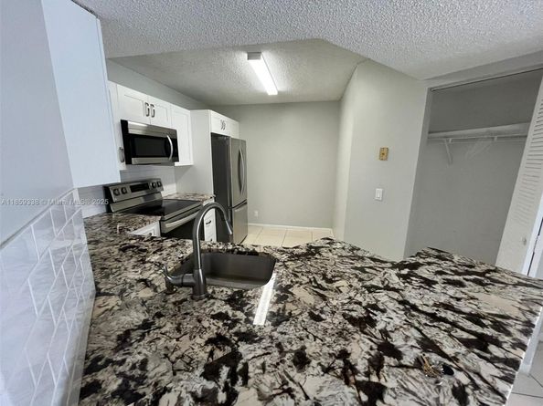 8821 Wiles Rd 203, Coral Springs FL 33067