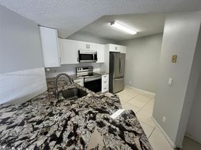 8821 Wiles Rd 203, Coral Springs FL 33067