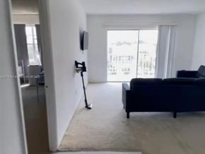 496 NW 165th St Rd D611, Miami FL 33169