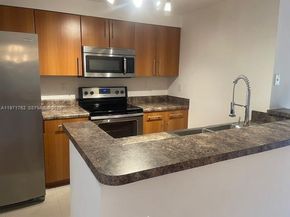 5960 W Sample Rd 305, Coral Springs FL 33067