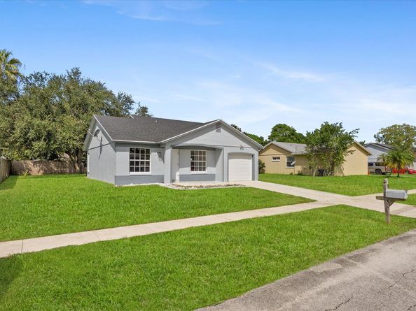 1355 Denlow Lane, Royal Palm Beach FL 33411