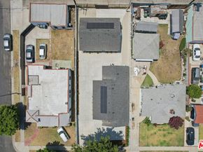 8779 S Hobart Boulevard, Los Angeles CA 90047