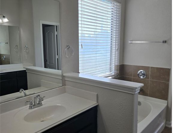 9702 S Layton Ridge Drive, Humble TX 77396
