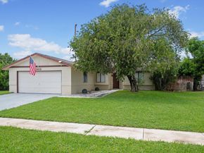 1403 Donwoods Lane, Royal Palm Beach FL 33411