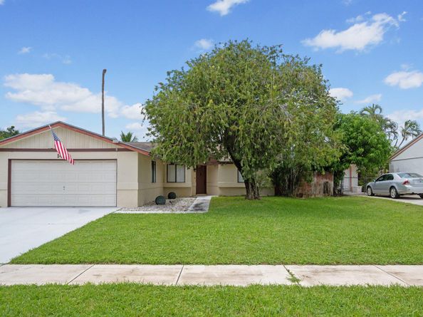 1403 Donwoods Lane, Royal Palm Beach FL 33411