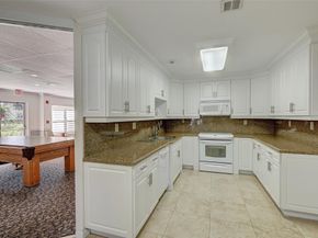 10777 W Sample Rd 408, Coral Springs FL 33065