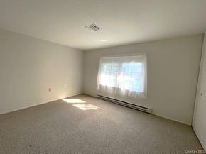 120 Exmore Court D, Ridge NY 11961