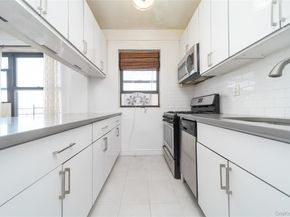 99-32 66th road Road 9N, Rego Park NY 11374