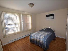 82 Village Circle W, Manorville NY 11949