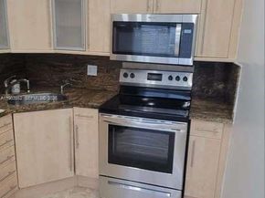 455 Golden Isles Dr 310, Hallandale Beach FL 33009