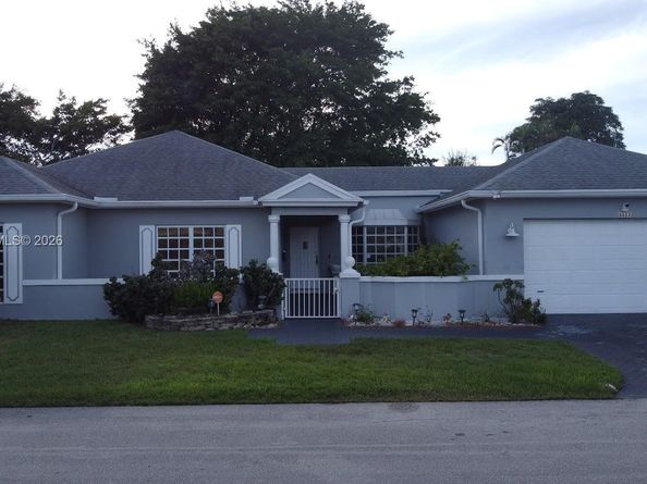 4511 Queen Palm Ln, Tamarac FL 33319