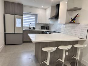 64 NW 52nd St, Miami FL 33127