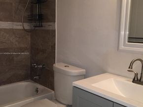 496 NW 165th St Rd D312, Miami FL 33169