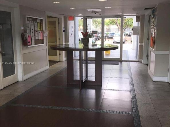 496 NW 165th St Rd D312, Miami FL 33169