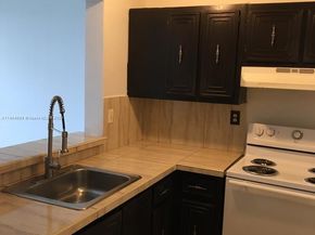 496 NW 165th St Rd D312, Miami FL 33169