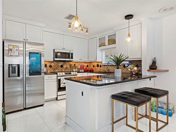 1463 NW 48th Ave, Coconut Creek FL 33063