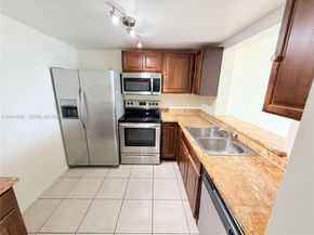 496 NW 165th St Rd D409, Miami FL 33169